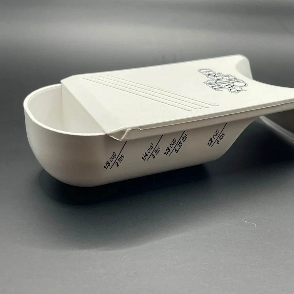 The Pampered Chef Adjustable Measuring Cup White Plastic 1/2 Cup 125ml USA made